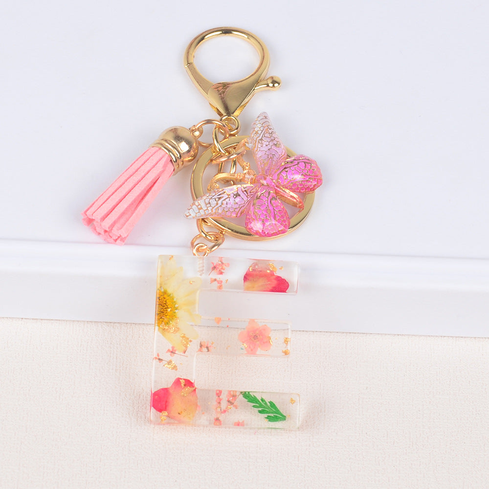 卸売ドライフラワーレター樹脂キーホルダー